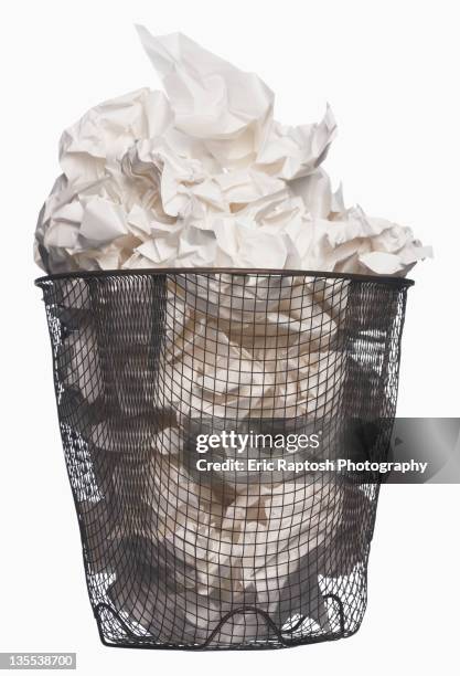 wastepaper basket full of garbage - crumpled paper pile stock pictures, royalty-free photos & images