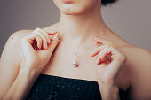 Model Showing Her Beautiful Necklace with Diamond Pendant