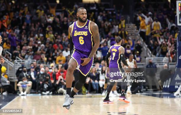 LeBron James of the Los Angeles Lakers celebrates in the 124-116 OT win against the Indiana Pacers at Gainbridge Fieldhouse on November 24, 2021 in...