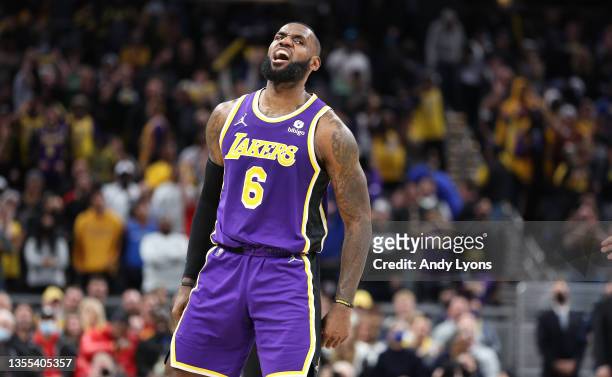LeBron James of the Los Angeles Lakers celebrates in the 124-116 OT win against the Indiana Pacers at Gainbridge Fieldhouse on November 24, 2021 in...