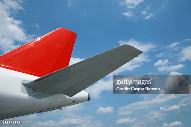 detail of an airplane - red plane stock pictures, royalty-free photos & images