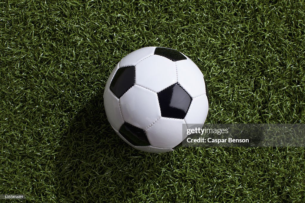 A soccer ball on turf