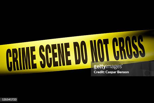 crime scene do not cross cordon tape - killing stock pictures, royalty-free photos & images
