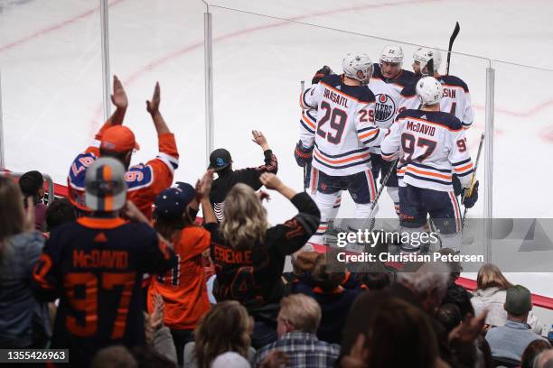 Leon Draisaitl, Tyson Barrie, Connor McDavid and Zack Kassian of the Edmonton Oilers celebrate after Kassian scored a goal against the Arizona...