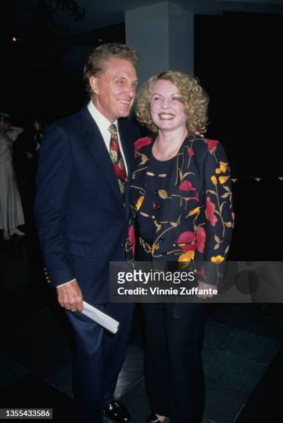 American actor Robert Stack and his wife, American actress and model Rosemarie Bowe Stack attend the 1998 Stars & Cars Gala, held at the Petersen...