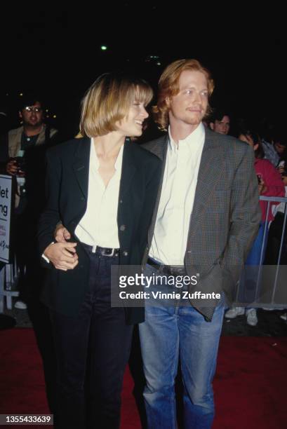 American actress Bridget Fonda and American actor Eric Stoltz attend the Hollywood premiere of 'Singles' held at Mann's Chinese Theatre in Los...