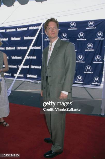 American actor Eric Stoltz, wearing a grey suit with a white shirt, attends the 15th Independent Spirit Awards, held at Santa Monica Beach in Santa...