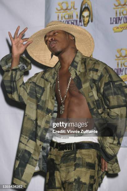 American singer Sisqo, wearing wide brim straw hat with a green-and-black shirt and matching trousers, attends the 5th Annual Soul Train Lady of Soul...