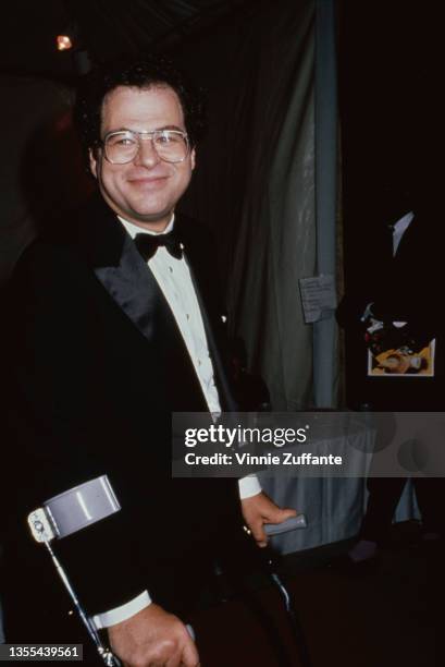 Israeli-American violinist conductor Itzhak Perlman, wearing a tuxedo, attends an Grammy Awards ceremony, United States, circa 1995. Having...