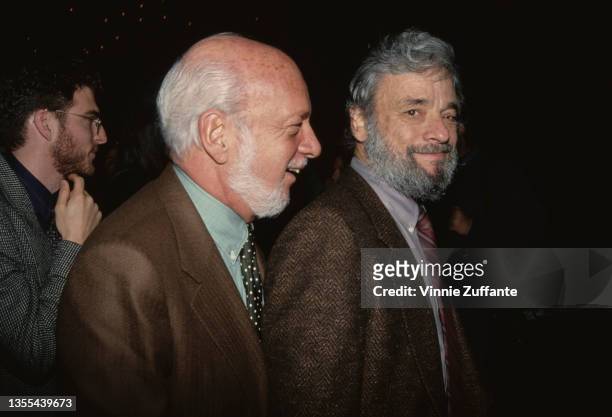 American theatrical director and producer Hal Prince , wearing a brown blazer and a green shirt with a spotted tie, and American composer and...