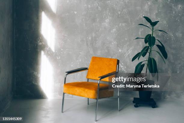 modern beautiful interior in a minimalist style. - chair stock pictures, royalty-free photos & images