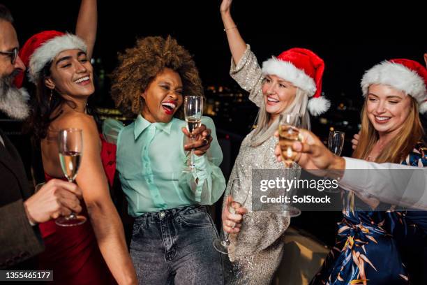 it's christmas time - drinking prosecco stock pictures, royalty-free photos & images