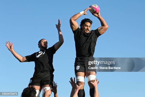Pete Samu of the Barbarians wins a line out from Ryan Wilson during a Barbarians Men's Squad Training session on November 25, 2021 in London,...