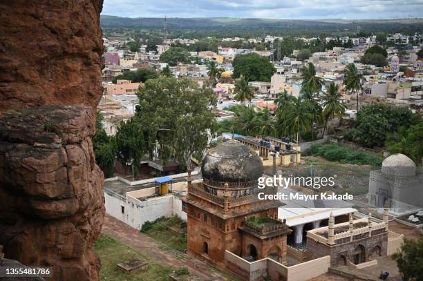 landscape view of a city and a mosque in badami, karnataka - islamabad stock pictures, royalty-free photos & images