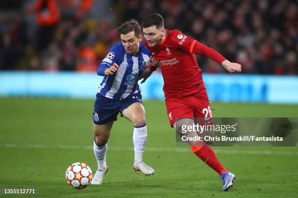 Andy Robertson of Liverpool in action with Francisco Conceicao of FC Porto during the UEFA Champions League group B match between Liverpool FC and FC...