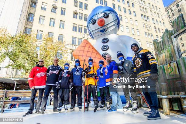 Winners of the Willie O'Ree Community Hero Award Kevin Hodgson and Rico Phillips pose with Former NHL Players Anson Carter and Bryce Salvador and...