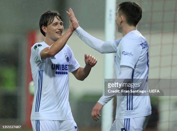 William Boving of FC Kobenhavn celebrates with teammate Isak Bergmann Johannesson after scoring their side's third goal during the UEFA Europa...