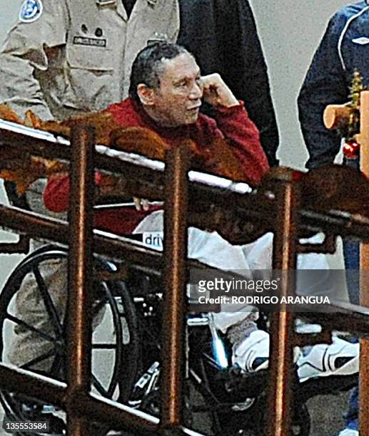 Former Panamenian dictator Manuel Noriega is seen after arriving at the Renacer prison, 25 km south east of Panama City, on December 11, 2011....