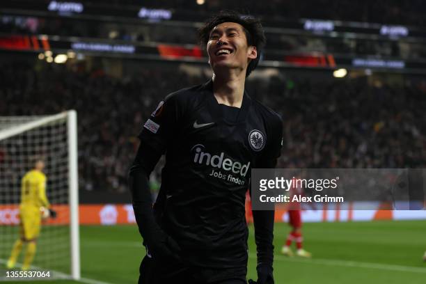 Daichi Kamada of Eintracht Frankfurt celebrates after scoring their side's first goal during the UEFA Europa League group D match between Eintracht...