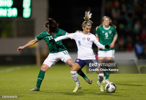 Aine O'Gorman of Ireland battles for possession with Patricia Hmirova of Slovakia during the FIFA Women's World Cup 2023 Qualifier group A match...