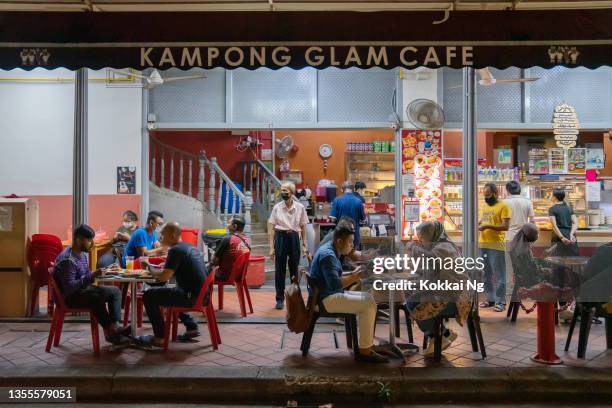 kampong glam coffee shop in singapore - singapore hawker table stock pictures, royalty-free photos & images