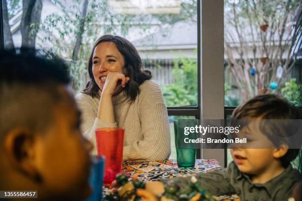 The Villagrana-Ocasio, Parish Moreno, and Yagar Dalton families bond together after a Thanksgiving meal on November 25, 2021 in Houston, Texas. "As...