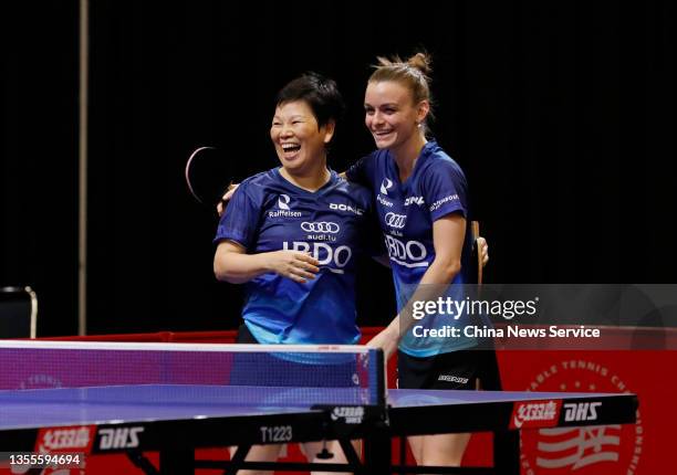 Ni Xialian and Sarah de Nutte of Luxembourg celebrate after winning the Women's Doubles round of 32 match against Liu Hsing-Yin and Cheng Hsien-Tzu...
