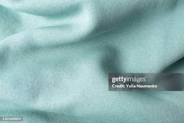 mint color jersey, fabric as a background, full frame. - caxemira - fotografias e filmes do acervo