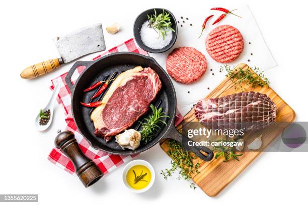 different cuts of raw meat on white background - pepper seasoning stock pictures, royalty-free photos & images