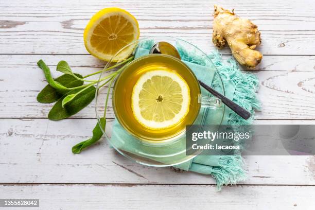 cup of sage and ginger tea - ginger tea stock pictures, royalty-free photos & images