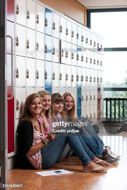 portrait of high school girls - school locker room stock pictures, royalty-free photos & images