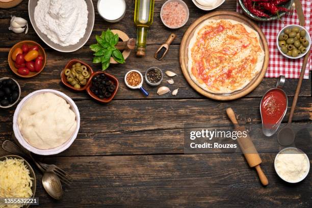 pizza and ingredients background - ingredient flatlay stock pictures, royalty-free photos & images