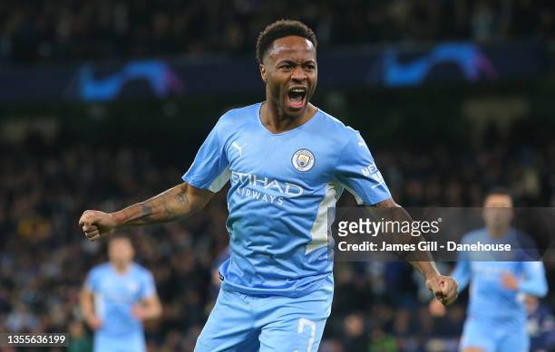 Raheem Sterling of Manchester City celebrates after scoring their first goal during the UEFA Champions League group A match between Manchester City...