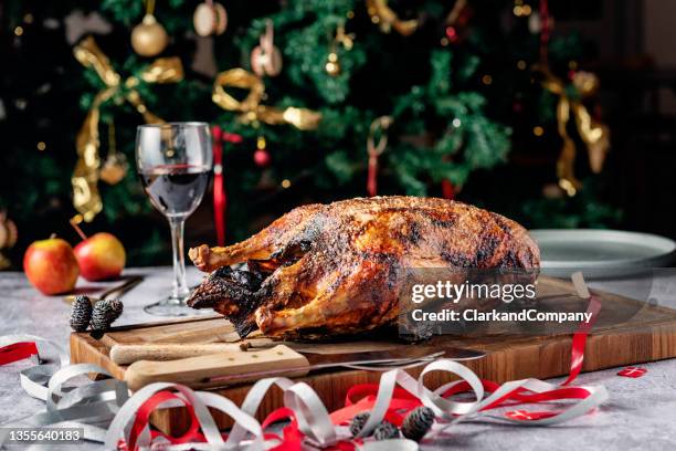 traditional danish christmas dinner of roast duck - duck stockfoto's en -beelden