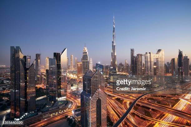 dubai cityscape at night"n - middle east stock pictures, royalty-free photos & images