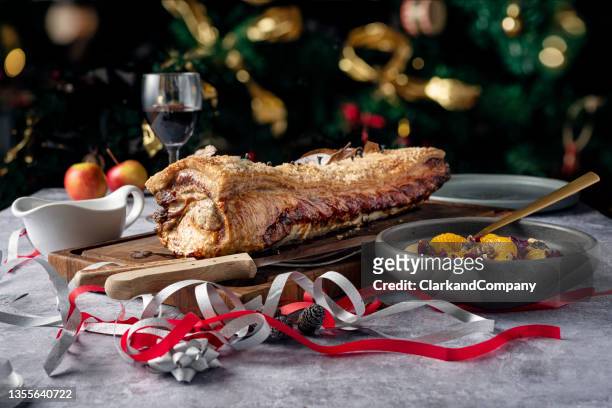 traditional danish christmas dinner of flæskesteg - danish culture stock pictures, royalty-free photos & images