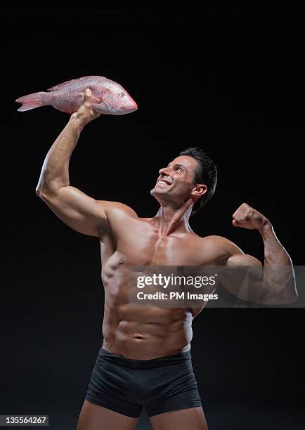 Fish With Arms Photos and Premium High Res Pictures - Getty Images