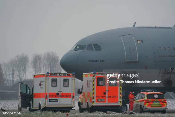 Medical personnel of the Bundeswehr load Covid patients onto a MedEvac Airbus A310 of the Luftwaffe during a transfer of patients out of Bavaria...