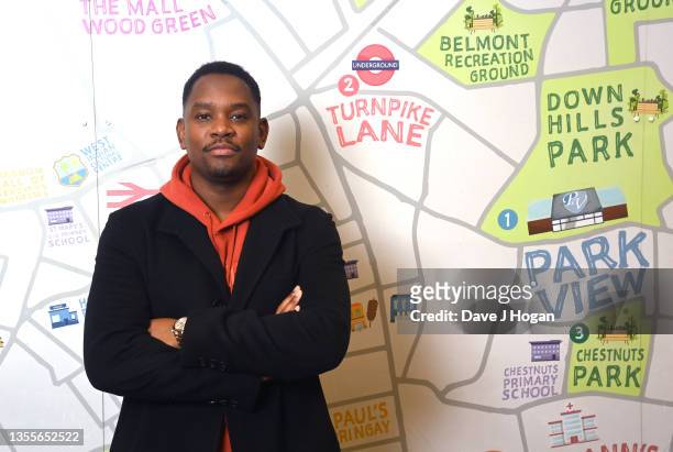 Aml Ameen, director and star of "Boxing Day", poses for a photo during his visit to pupils from Park View School on November 26, 2021 in London,...