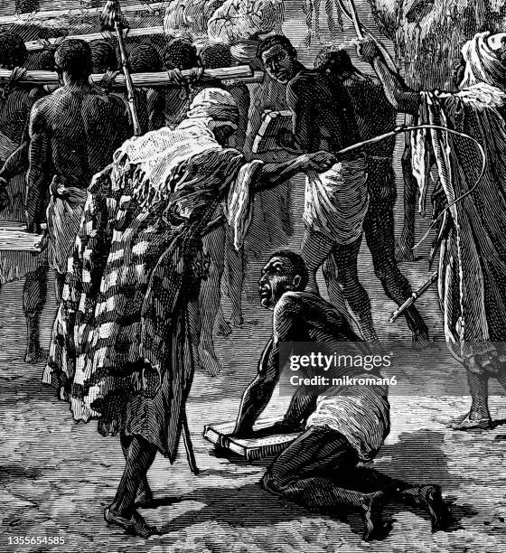 old engraved illustration of the slave trade in africa - sklaverei stock-fotos und bilder
