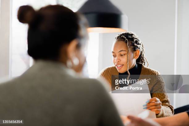 woman candidate interview with hr manager in office - recruiter stock pictures, royalty-free photos & images
