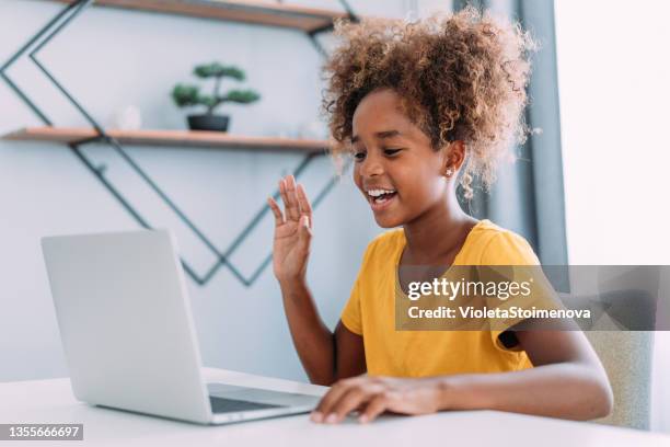 cheerful girl having video call at home. - hello my name is stock pictures, royalty-free photos & images