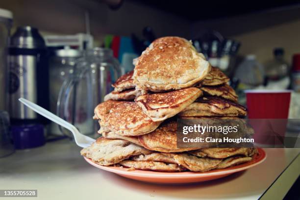 pancake surprise - pancake turner stock pictures, royalty-free photos & images