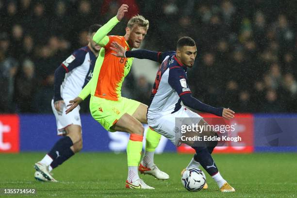 Karlan Grant of West Bromwich Albion battles for the ball with Joe Worrall of Nottingham Forest during the Sky Bet Championship match between West...
