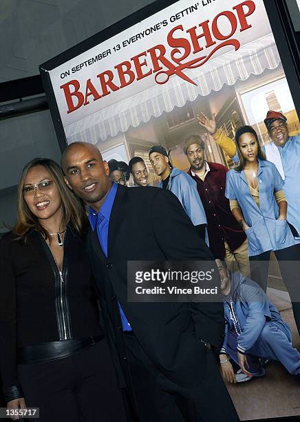 Director Tim Story and Vicky Myara attend the premiere of the film "Barbershop" on August 26, 2002 in Hollywood, California.