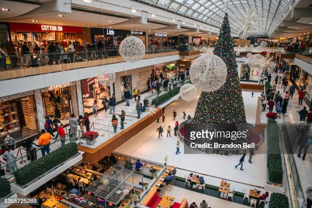 People shop in The Galleria mall during Black Friday on November 26, 2021 in Houston, Texas. Retailers are anticipating a busier holiday season than...