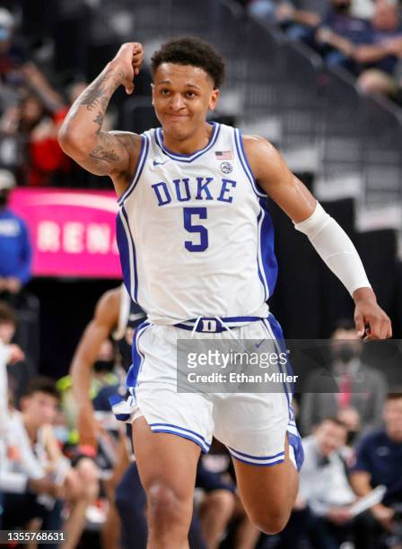 Paolo Banchero of the Duke Blue Devils reacts after dunking against the Gonzaga Bulldogs during the Continental Tire Challenge at T-Mobile Arena on...