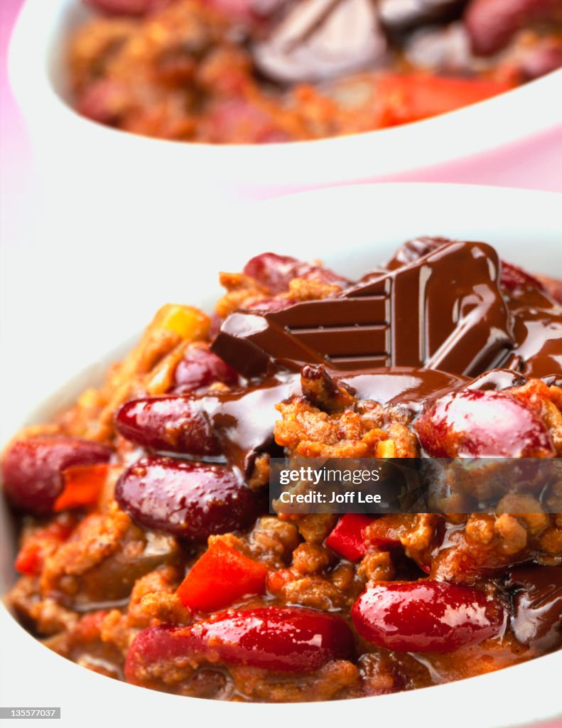 Dish of chilli with chocolate melted on top