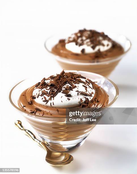 two chocolate mousses in glass bowls with spoon - pudding stock pictures, royalty-free photos & images