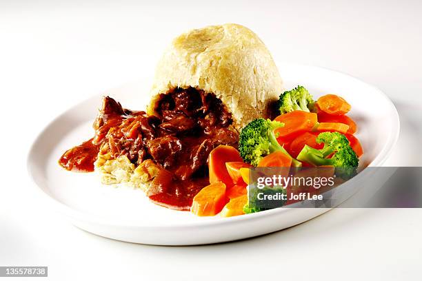 steak & kidney pudding with vegetables - steak pie stock pictures, royalty-free photos & images
